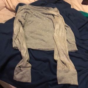 This shirt has a lot of sparkles